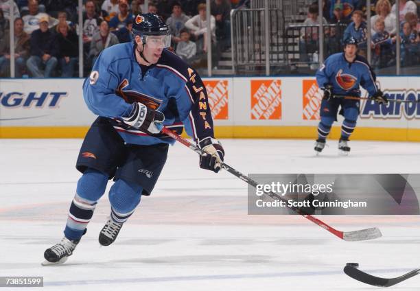 Pascal Dupuis of the Atlanta Thrashers skates with the puck against the Buffalo Sabres during their NHL game on March 18, 2007 at Philips Arena in...