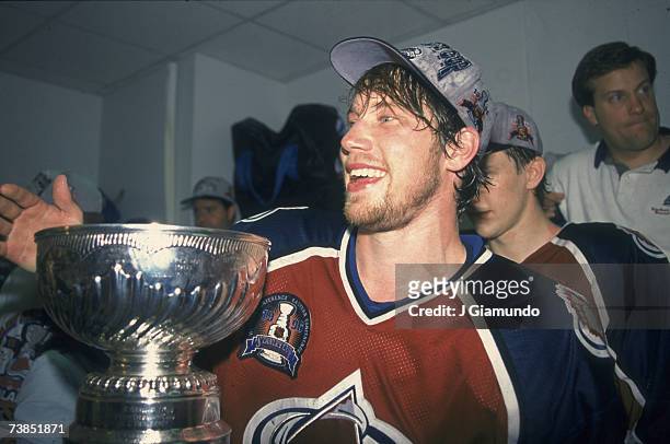 Swedish professional ice hockey player Peter Forsberg of the Pittsburgh Penguins poses with the Stanley Cup trophy in celebration of his team's...