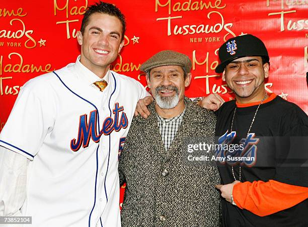New York Mets third baseman David Wright, contest winners Laurentino Rio and Larry Rio attend the unveiling of Wright's wax figure at Madame Tussauds...