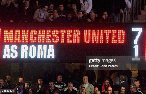 The Old Trafford scoreboard shows the final score during the UEFA Champions League Quarter Final second leg match between Manchester United and AS...