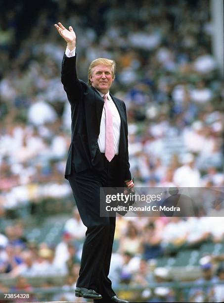 Donald Trump throws out the first pitch before a game between the Chicago White Sox and the Chicago Cubs in July 2000 in Chicago, Illinois.