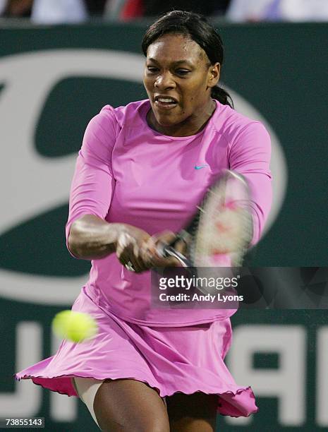 Serena Williams hits a return during her match against Yung-Jan Chan of Chinese Taipei during the Family Circle Cup at the Family Circle Tennis...