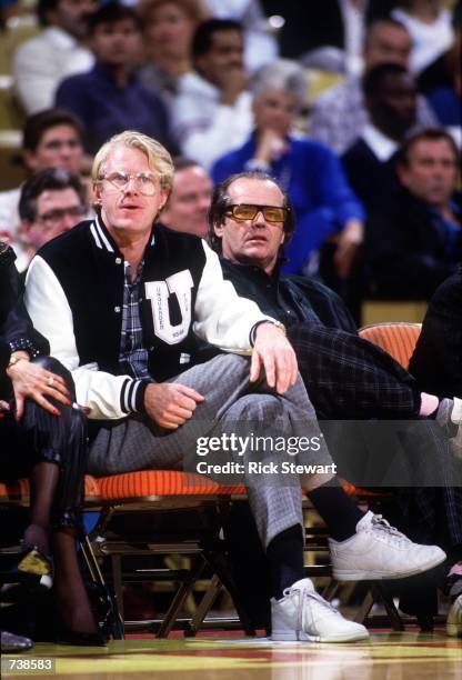 Actors Ed Begley, Jr., left, and Jack Nicholson attend a Los Angeles Lakers basketball game in the late 1980's at the Great Western Forum in...