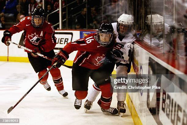 Jayna Hefford of Canada skates ahead of Natalie Darwtiz of the USA during the IIHF Women's World Championship Gold Medal game on April 10, 2007 at...