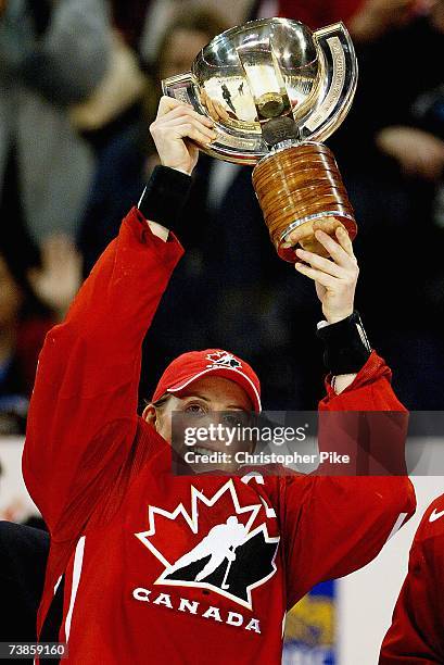 Captain Hayley Wickenheiser of Canada raises the trophy after the victory against the USA in the IIHF Women's World Championship Gold Medal game on...