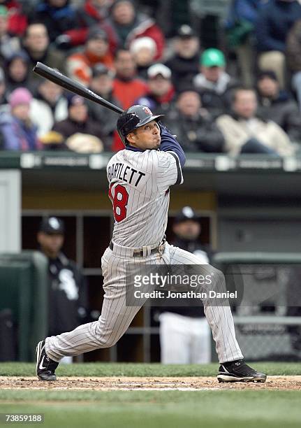 Jason Bartlett of the Minnesota Twins swings at the pitch during the game against the Chicago White Sox on April 7, 2007 at U.S. Cellular Field in...