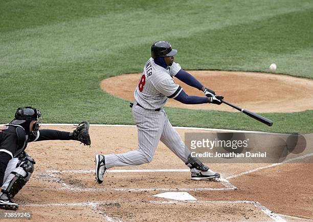 Torii Hunter the Minnesota Twins makes a hit during the game against the Chicago White Sox on April 7, 2007 at U.S. Cellular Field in Chicago,...