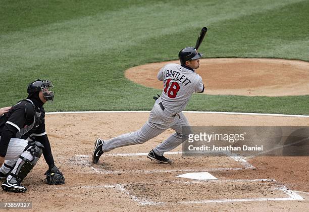 Jason Bartlett of the Minnesota Twins makes a hit during the game against the Chicago White Sox on April 7, 2007 at U.S. Cellular Field in Chicago,...