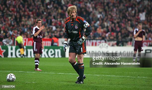 Oliver Kahn of Munich and his team mates Philipp Lahm and Christian Lelle looking dejected after receiving the second goal during the UEFA Champions...