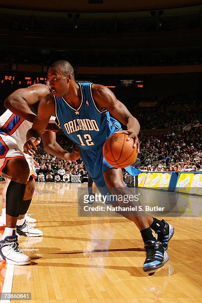 Dwight Howard of the Orlando Magic drives towards the lane against the New York Knicks during the game at Madison Square Garden on March 26, 2007 in...