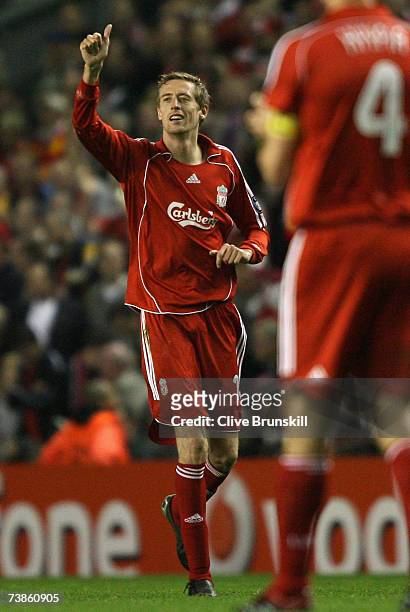 Peter Crouch of Liverpool celebrates scoring his team's first goal during the UEFA Champions League Quarter Final, second leg match between Liverpool...