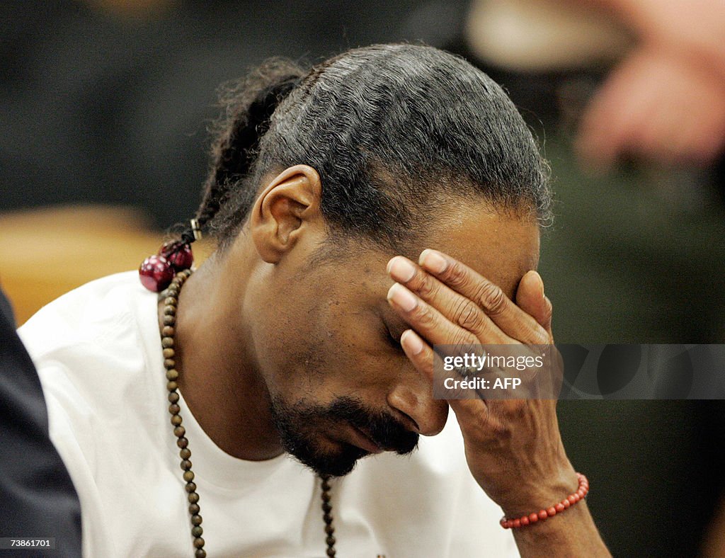 Rapper Snoop Dogg sits in the Pasadena S...
