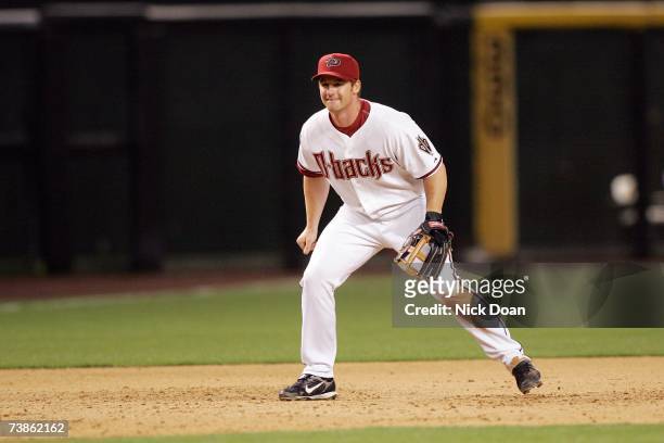 Chad Tracy of the Arizona Diamondbacks plays third base against the Cincinnati Reds during the Home Opener at Chase Field on April 9, 2007 in...