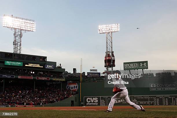 Starting pitcher Daisuke Matsuzaka of the Boston Red Sox warms up before taking on the Seattle Mariners on April 11, 2007 at Fenway Park in Boston,...
