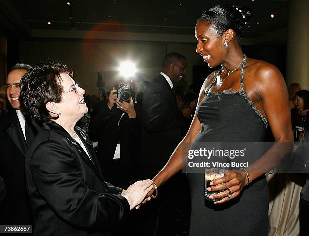 Legendary tennis player Billie Jean King shakes hands with WNBA player Lisa Leslie inside the VIP reception for The Billies presented by The Women's...