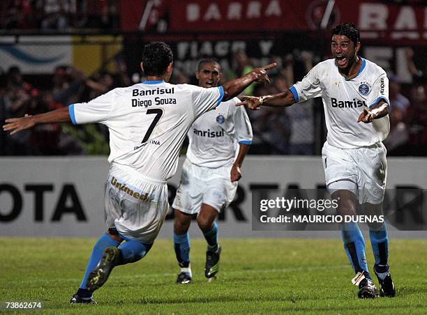 William and Diego Souza , of Gremio of Brazil, celebrate after scoring against Cucuta of Colombia during their Libertadores Cup football match, 11...
