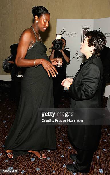 Legendary tennis player Billie Jean King talks with WNBA player Lisa Leslie inside the VIP reception for The Billies presented by The Women's Sports...