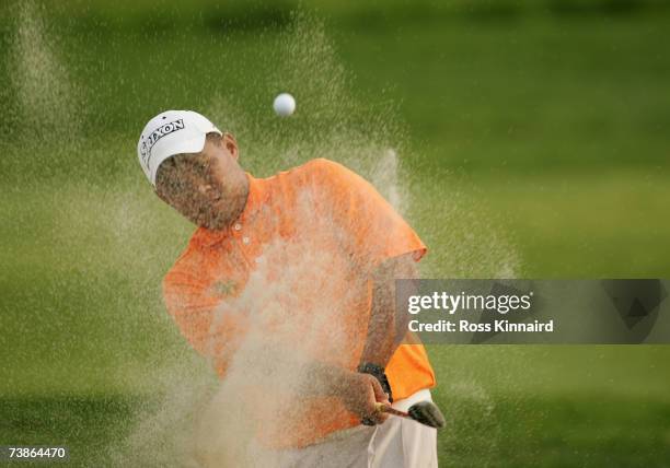 Chapchai Nirat of Thailand plays on the par five 18th hole during the first round of the Volvo China Open at the Shanghai Silport Golf Club on April...