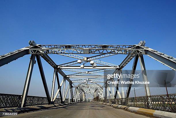 The destroyed al-Sarafiya bridge is seen after a suicide bomb attack, on April 12, 2007 in Baghdad, Iraq. A suicide truck bomb exploded on the busy...