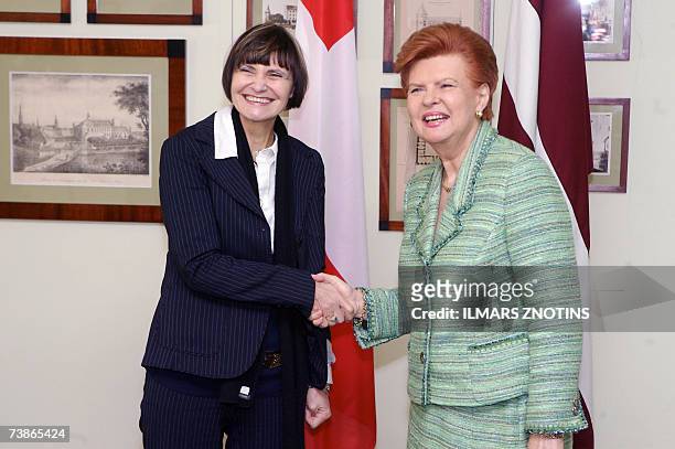 President of Latvia Vaira Vike-Freiberga and her Swiss counterpart Micheline Calmy-Rey dpose uring their meeting in Riga 12 April 2007.AFP...