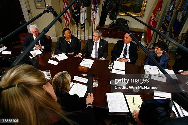 President George W. Bush speaks to reporters following a meeting on reauthorization of the No Child Left Behind Act at the White House April 12, 2007...