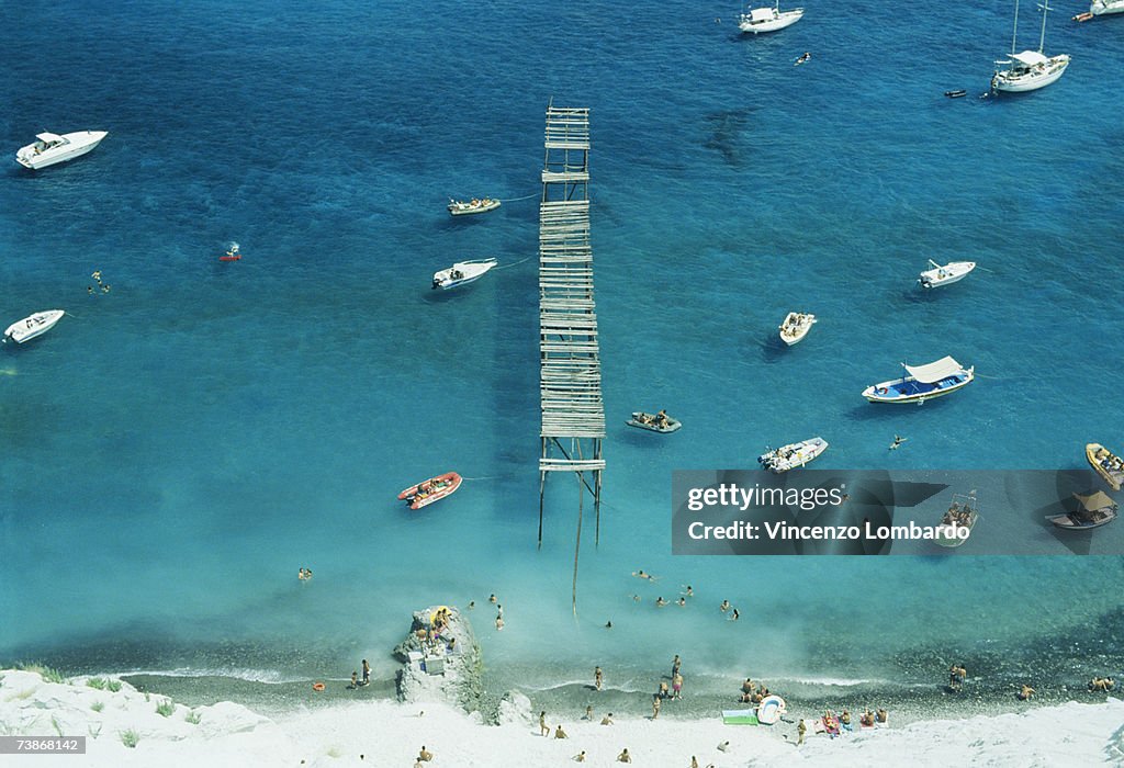 Italy, Sicily, Lipari, Boats at beach, aerial view