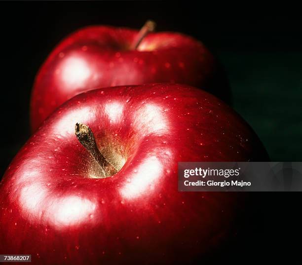 two red apples, close-up - juicy stock pictures, royalty-free photos & images