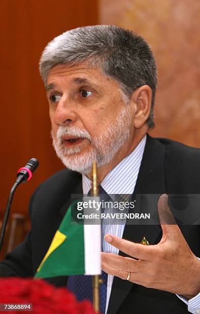 Brazilian Foreign Minister Celso Amorim gestures as he answers a question during a press conference in New Delhi, 12 April 2007, after Ministers from...