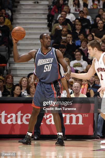 Emeka Okafor of the Charlotte Bobcats looks for an open pass during the game against the Toronto Raptors at Air Canada Centre on April 1, 2007 in...