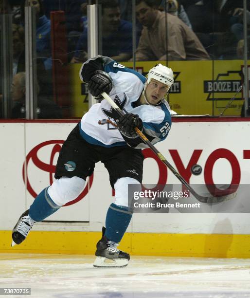 Ryane Clowe of the San Jose Sharks passes the puck against the Nashville Predators during their 2007 Western Conference Quarterfinals game on April...