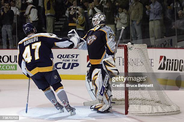 Tomas Vokoun of the Nashville Predators high fives Alexander Radulov against the San Jose Sharks during their 2007 Western Conference Quarterfinals...