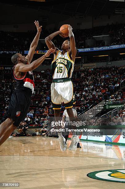Mickael Gelabale of the Seattle SuperSonics takes a jump shot against Fred Jones of the Portland TrailBlazers during the game at KeyArena on February...