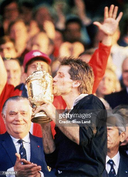 David Kirk of New Zealand kisses the Willam Webb Ellis Trophy after the 1987 Rugby World Cup Final match between New Zealand and France at Eden Park...