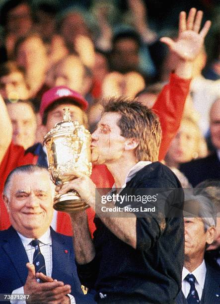 David Kirk of New Zealand kisses the Willam Webb Ellis Trophy after the 1987 Rugby World Cup Final match between New Zealand and France at Eden Park...
