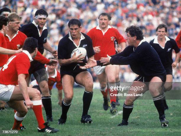 Wayne Shelford of New Zealand prepares to take the ball into contact during the 1987 Rugby World Cup Semi-Final match between New Zealand and Wales...
