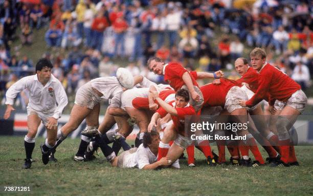 Robert Jones of Wales passes the ball from a scrum during the 1987 Rugby World Cup Quarter-Final match between Wales and England at Ballymore Stadium...