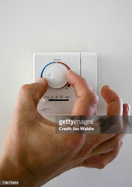 An air-conditioning unit is tested in a revoloutionary and environmentally-friendly housing estate April 13, 2007 in Sydney, Australia. 16 houses in...