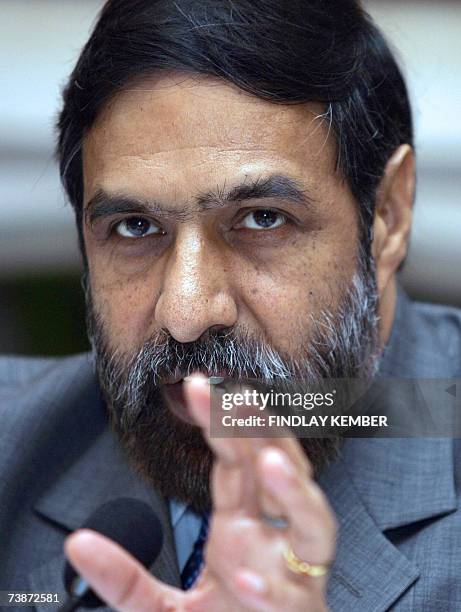 India's Minister of State for External Affairs Anand Sharma gestures as he addresses media representatives after a meeting with Brazilian Foreign...