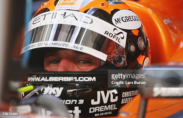 Christijan Albers of The Netherlands and Spyker F1 waits in the garage before driving during practice for the Bahrain Formula One Grand Prix at the...