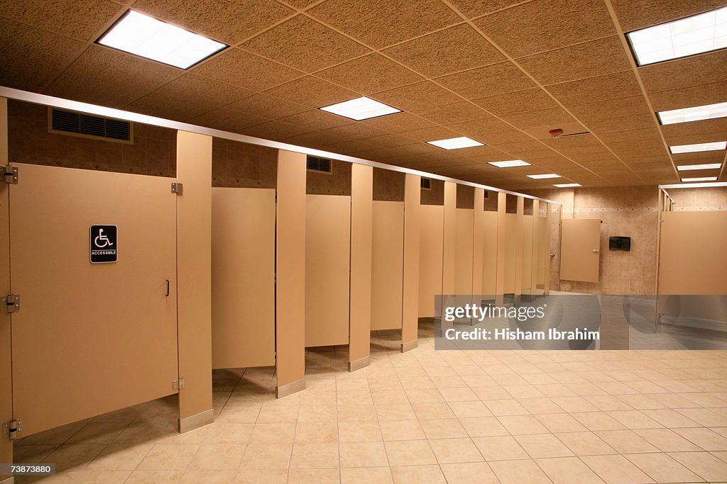 Toilet stalls in a public restroom, Delaware, USA