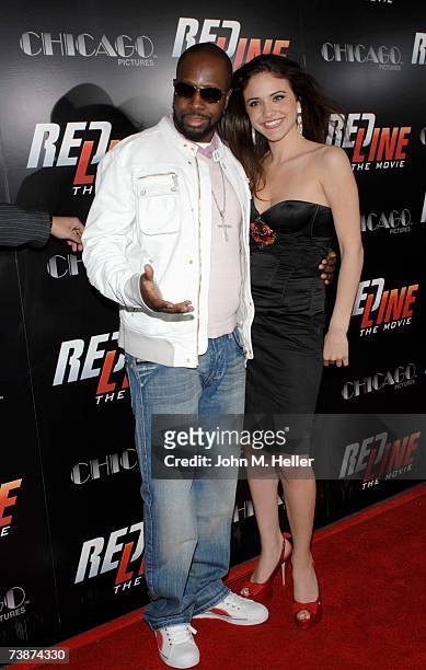 Wyclef Jean and Miriam Habib attend the Los Angeles Premiere of "Redline" at Grauman's Chinese Theater on April 12, 2007 in Hollywood, California.