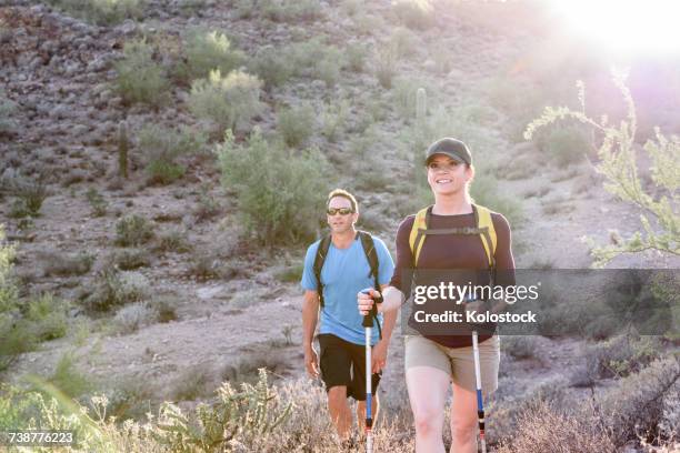 couple hiking in desert - phoenix arizona desert stock pictures, royalty-free photos & images