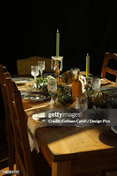 a table set for formal dining - formal dining table stock pictures, royalty-free photos & images