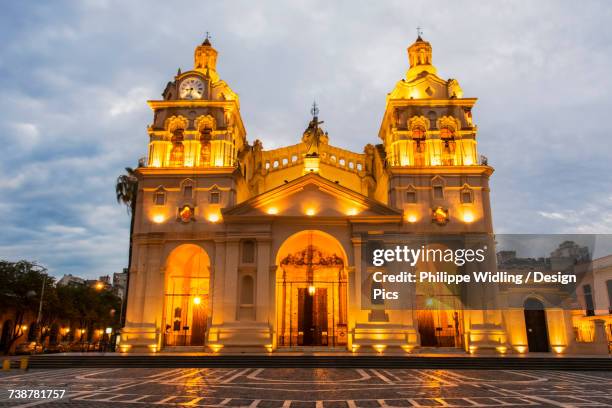 fully lit south american church and plaza at dusk - cordoba argentina stock pictures, royalty-free photos & images