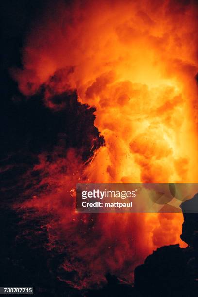 close-up lava flowing from a lava tube into pacific ocean, hawaii, america, usa - volcanic landscape stock pictures, royalty-free photos & images