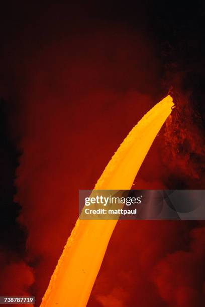 close-up lava flowing from a lava tube into pacific ocean, hawaii, america, usa - lava tube stock pictures, royalty-free photos & images