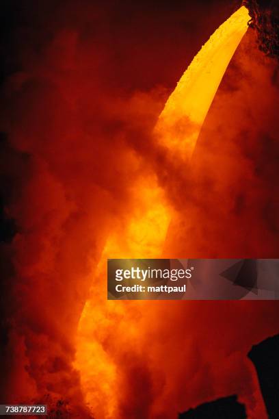 close-up lava flowing from a lava tube into pacific ocean, hawaii, america, usa - lava tube stock pictures, royalty-free photos & images