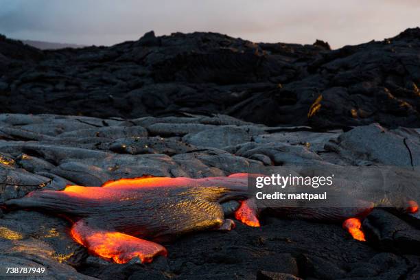 Lava Flowing at sunset, Hawaii Volcanoes National Park, Hawaii, America, USA