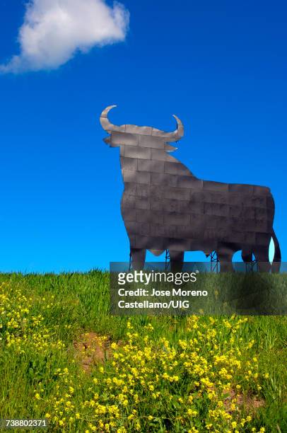 "bull silhouette, typical advertising of spanish sherry osborne, spain" - bull billboard spain stock pictures, royalty-free photos & images