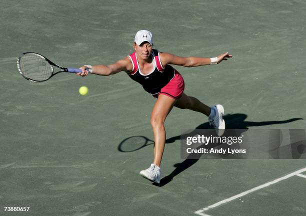 Vera Zvonareva of Russia hits a return in her 6-1,7-5 win over Michaella Krajicek of the Netherlands during the Family Circle Cup at the Family...